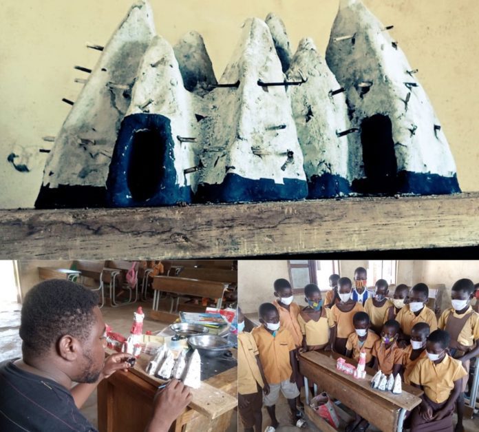 Basic 4 Teacher uses clay to model tourist sites