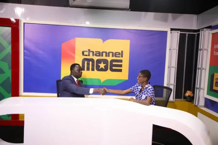 MOE-Dr-Yaw-Osei-Adutwum-left-with-a-student-in-the-studio- Ghana’s Ministry of Education launches Channel MoE, a TV station broadcasting quality educational content to 27 African countries. Learn more about its impact and goals.